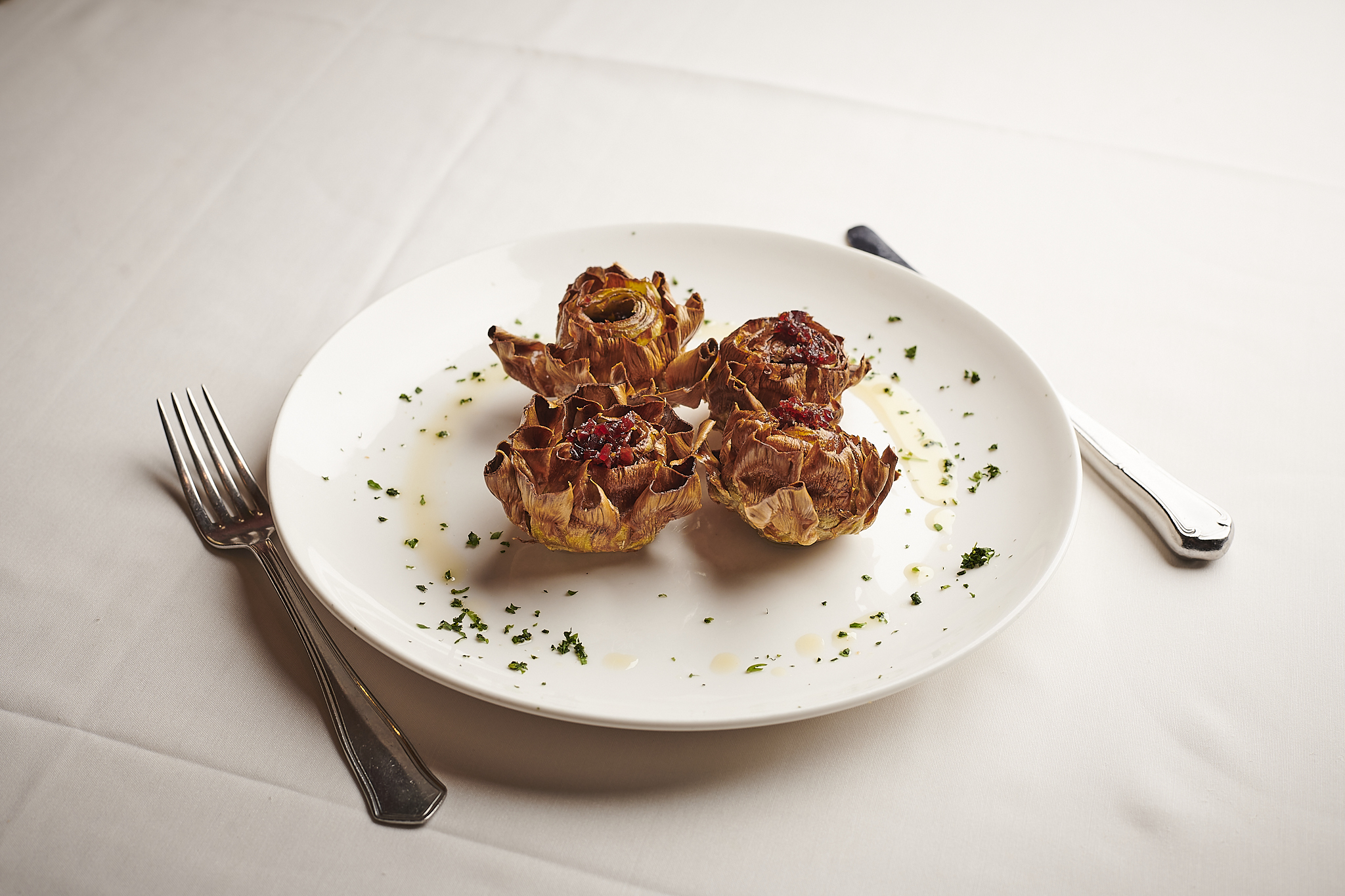 Flor de alcachofa con picada de jamón, Las Reses