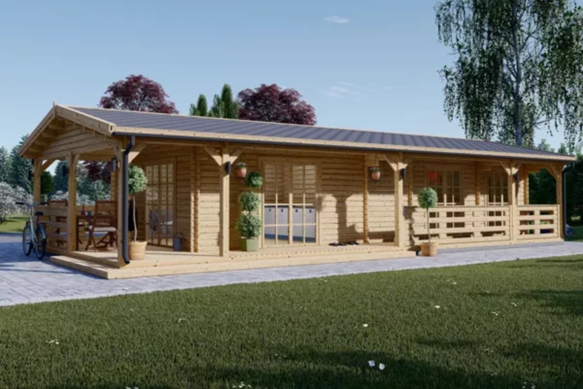 La casa prefabricada ideal para el verano: terraza cubierta de 29 m² y amplio salón con cocina abierta