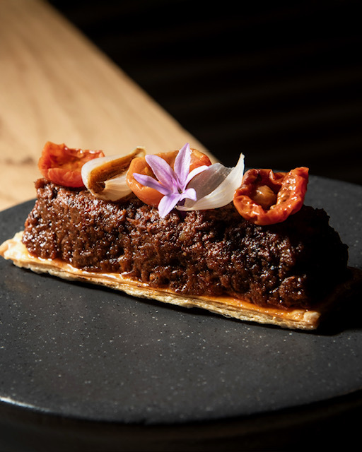 Picada de carne de In-Pulso.