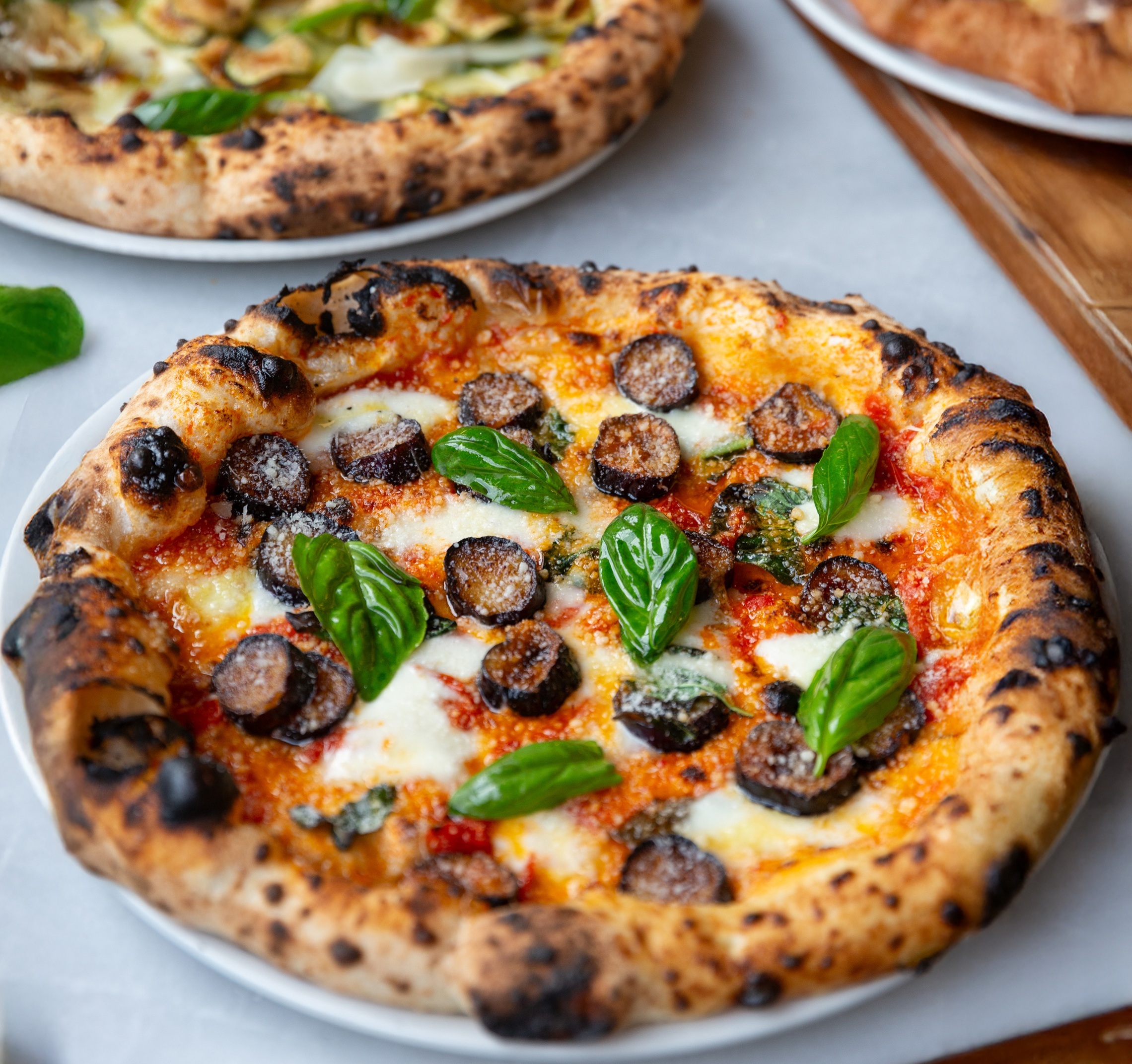 Pizza 'parmigiana di melanzane', en Frantelli Figurato.