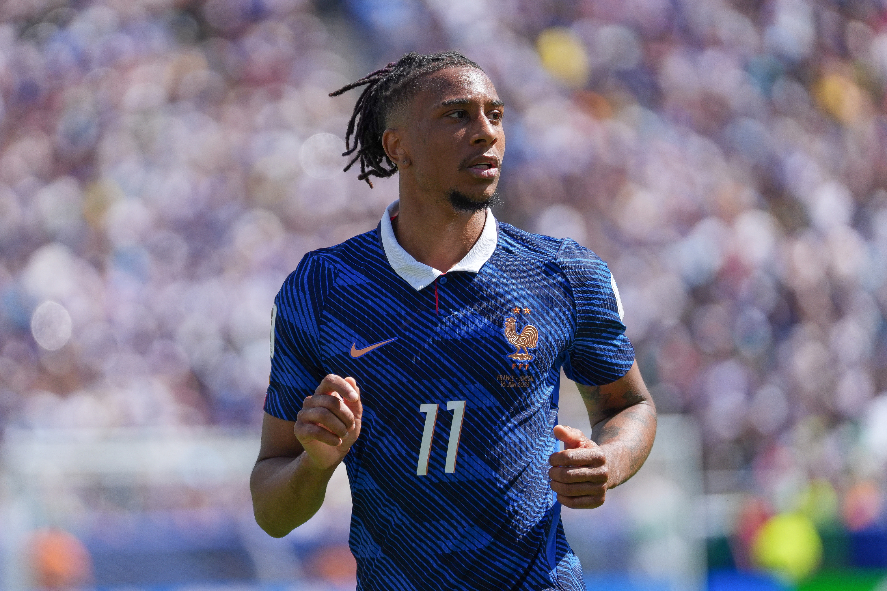 Olise, en un partido con Francia.