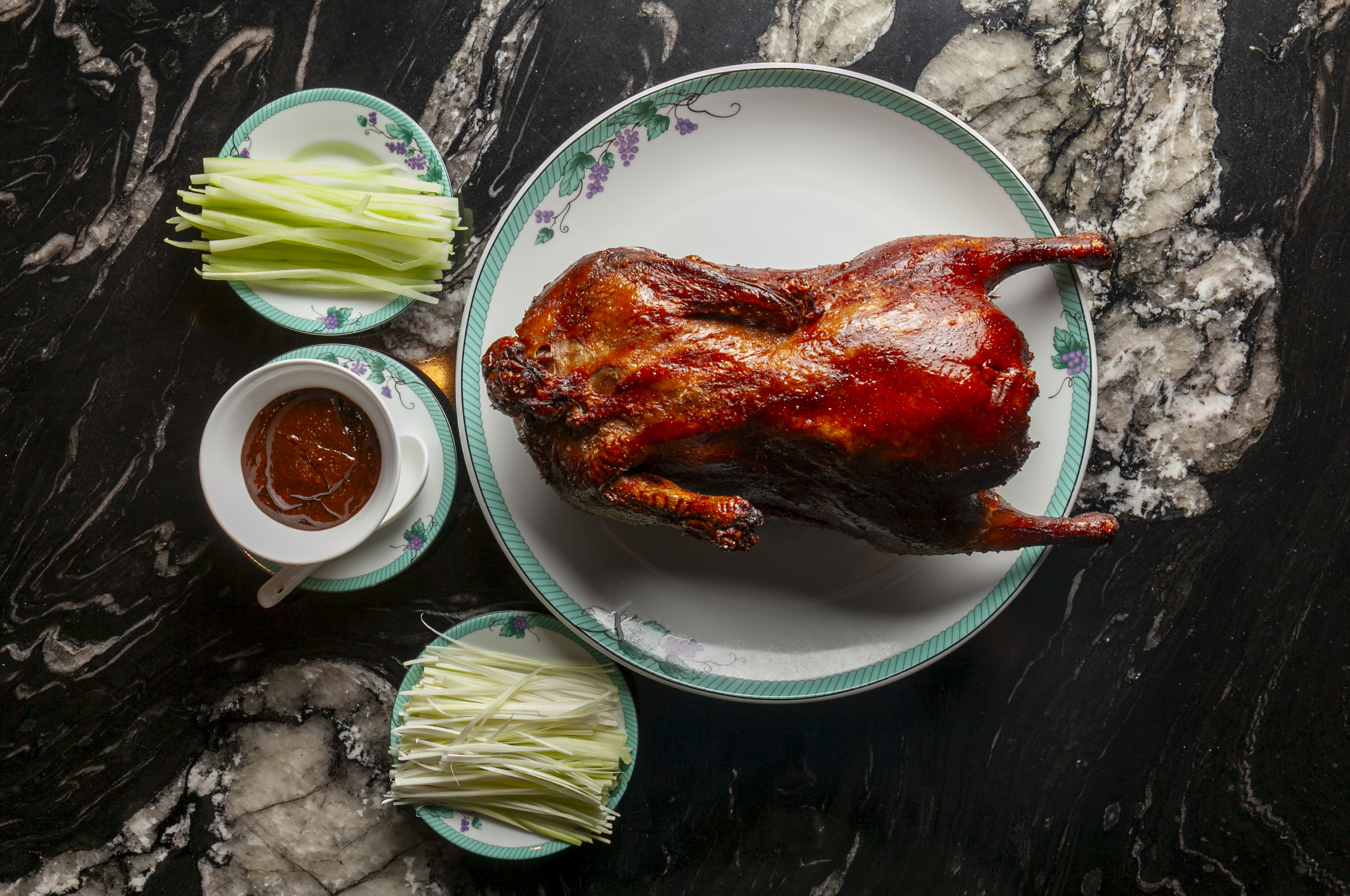 El pato laqueado de Tse Yang, su plato estrella.