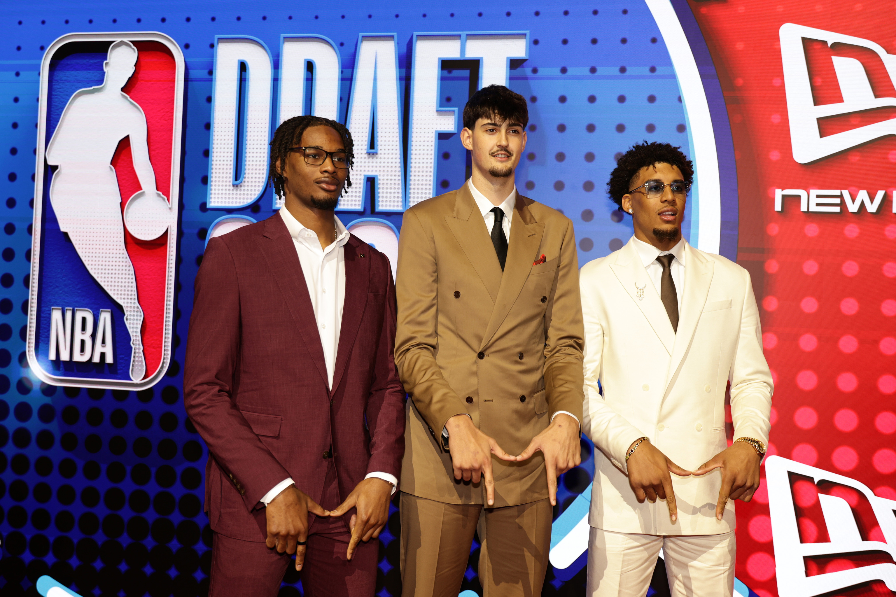 Morez Johnson Jr., Mara y Yaxel Lendeborg, los tres jugadores de Michigan en el draft.