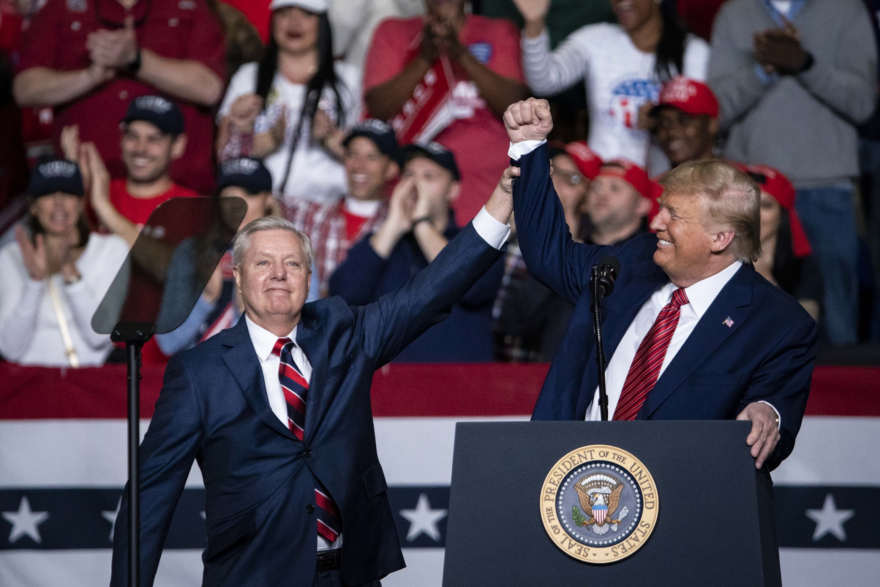 Donald Trump con Lindsey Graham, el 28 de febrero de 2020.