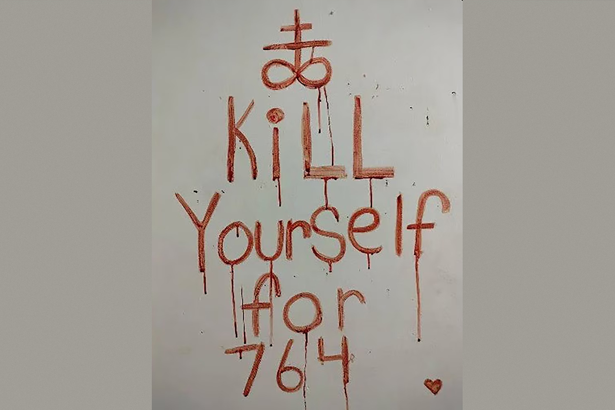 Frase en la pared en menci�n a la red 764 creada por Bradley Chance