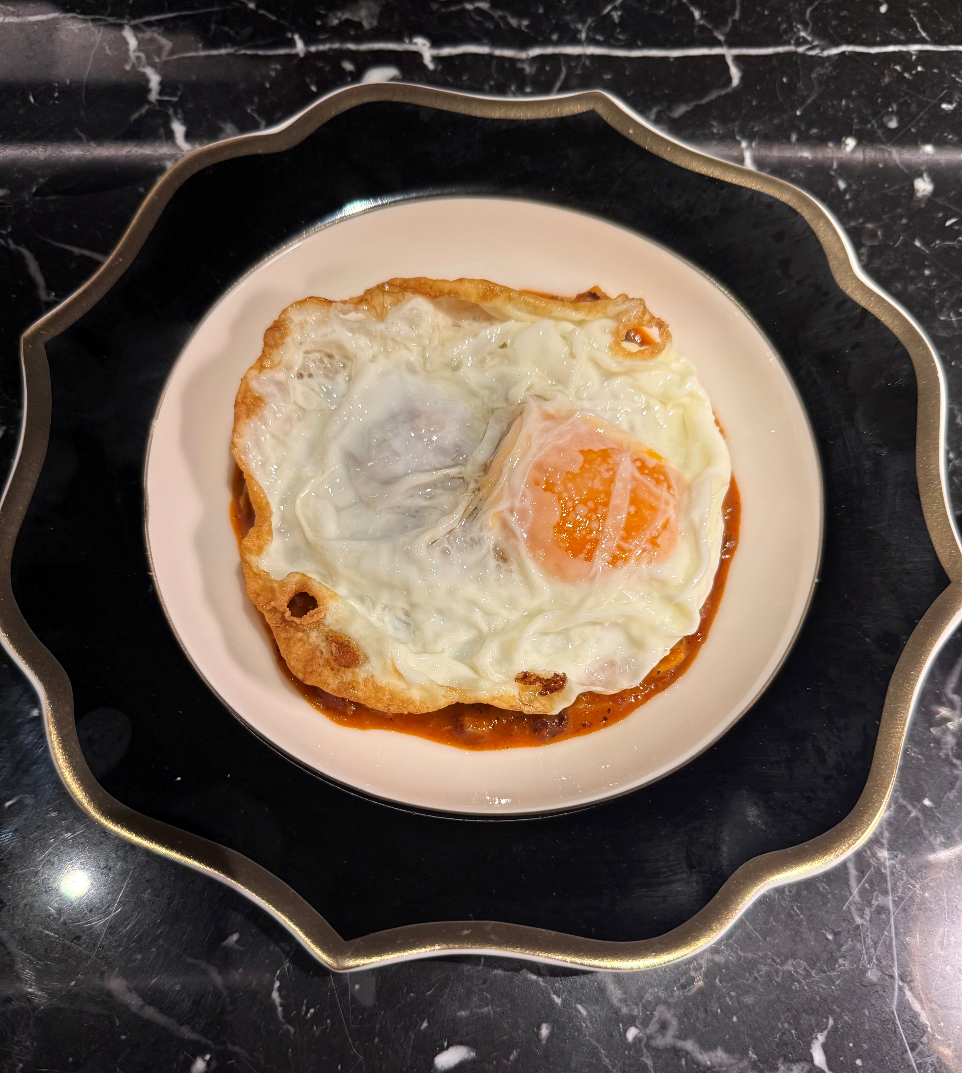 Callos con huevos fritos.