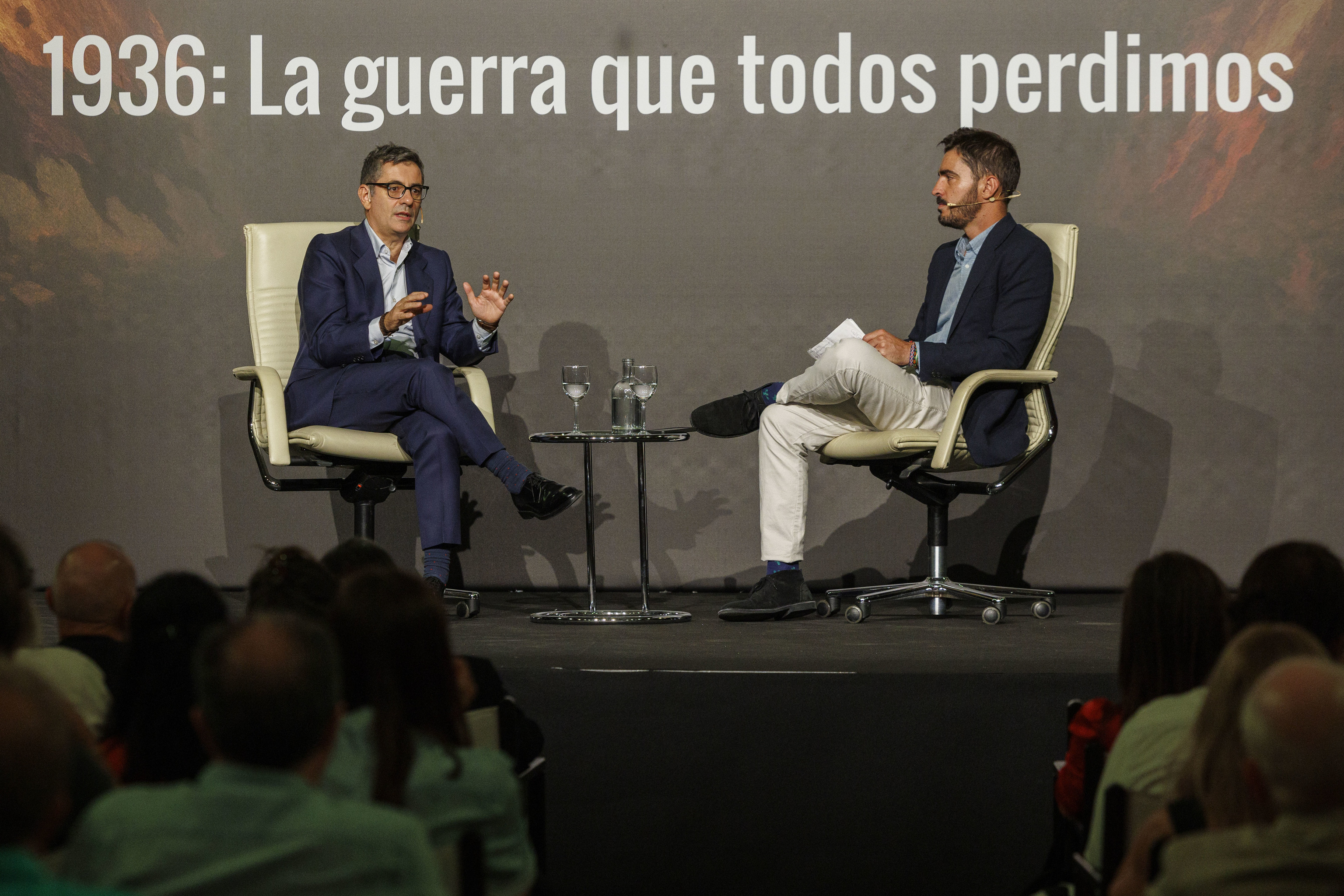 El ministro Félix Bolaños y el periodista Juanma Lamet.